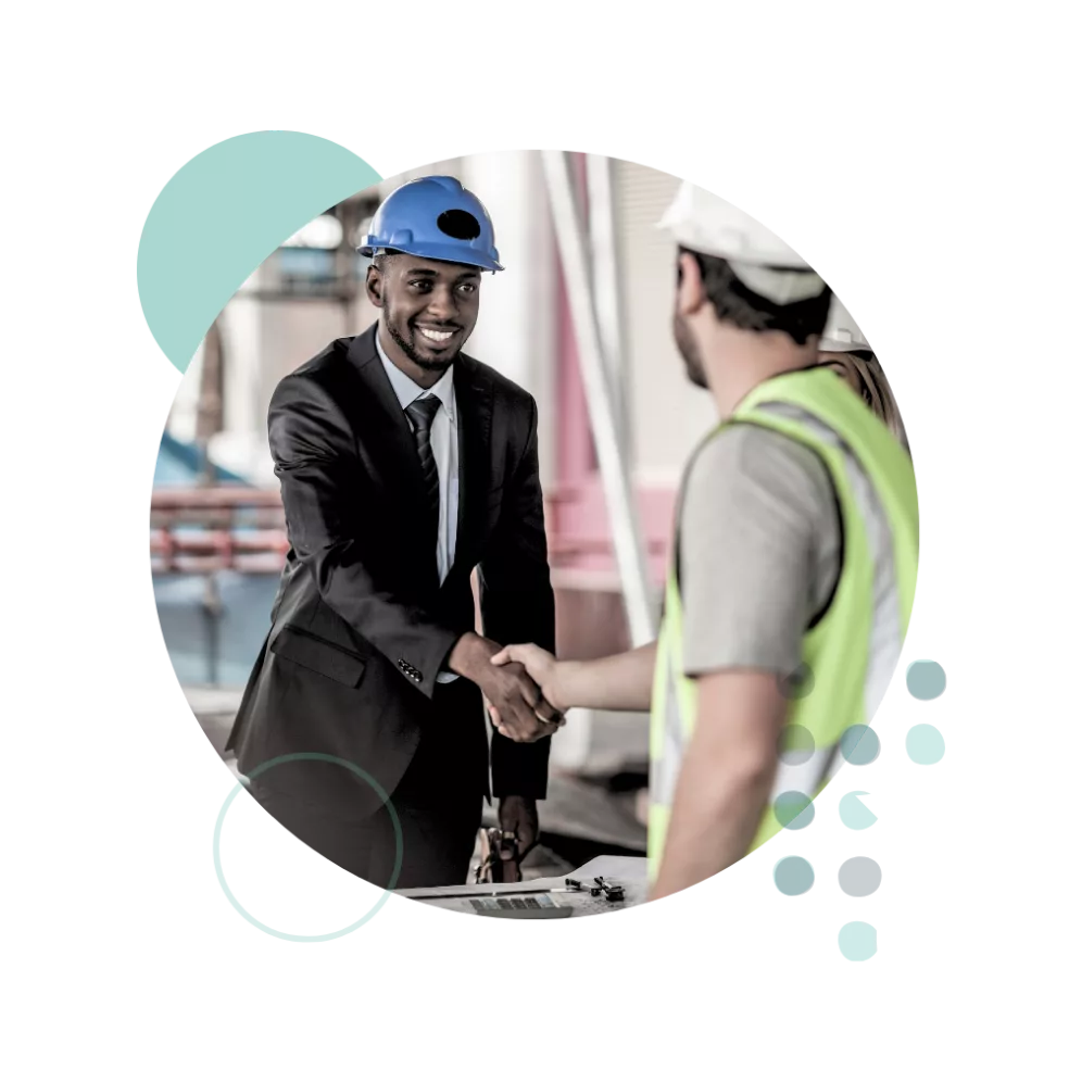 construction-manager-in-suit-shaking-hands-with-worker