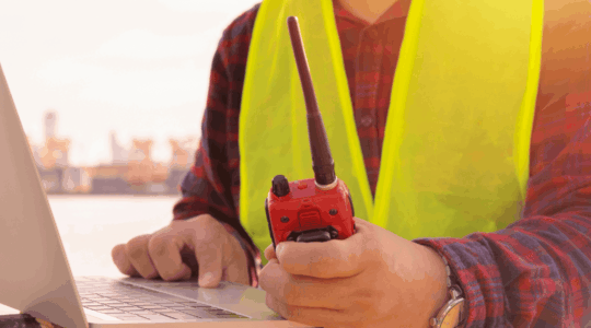safety-vest-laptop-walkie-talkie